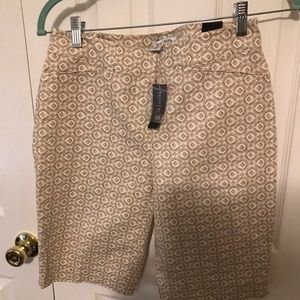 Brown and white/beige shorts.